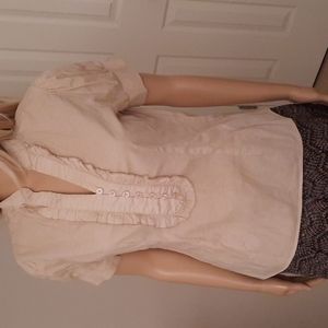 Tan and white polka dot top with ruffles